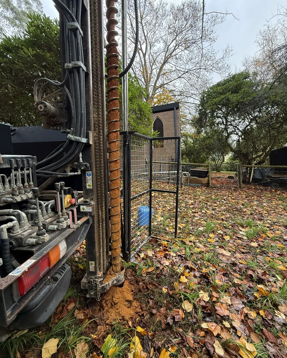 Drilling and soil sampling for a site classification report