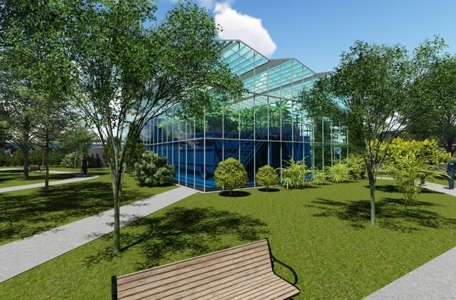 Project illustration showing a glass-covered water recycling facility among trees, lawns and pedestrian paths.